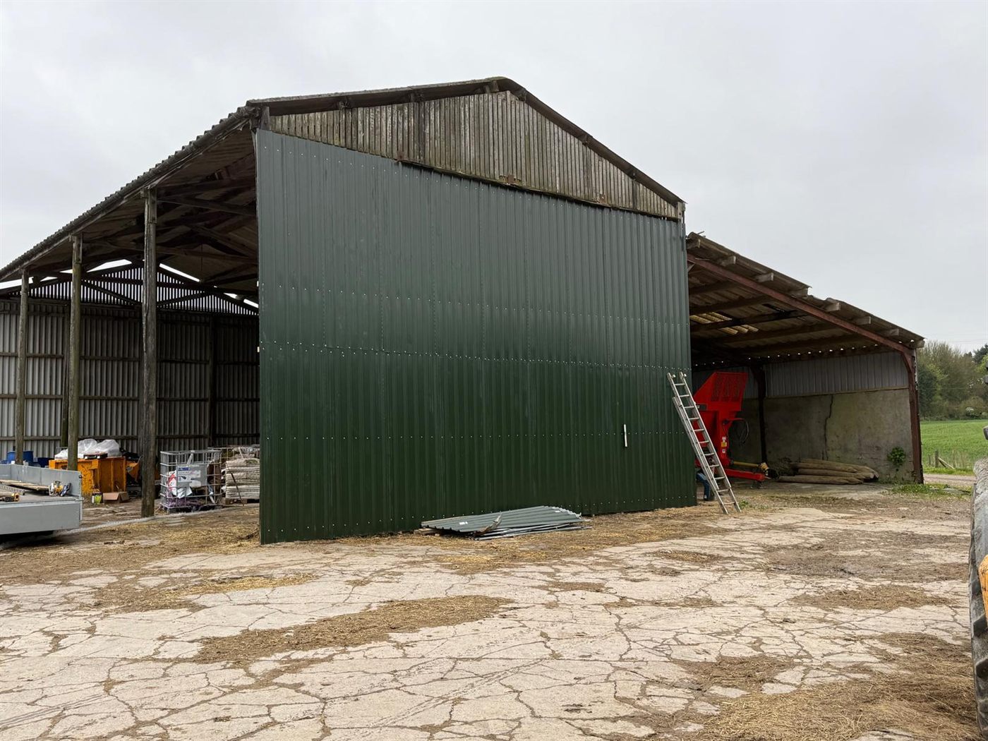 The same farm building after ESW re-roofed it, job 1