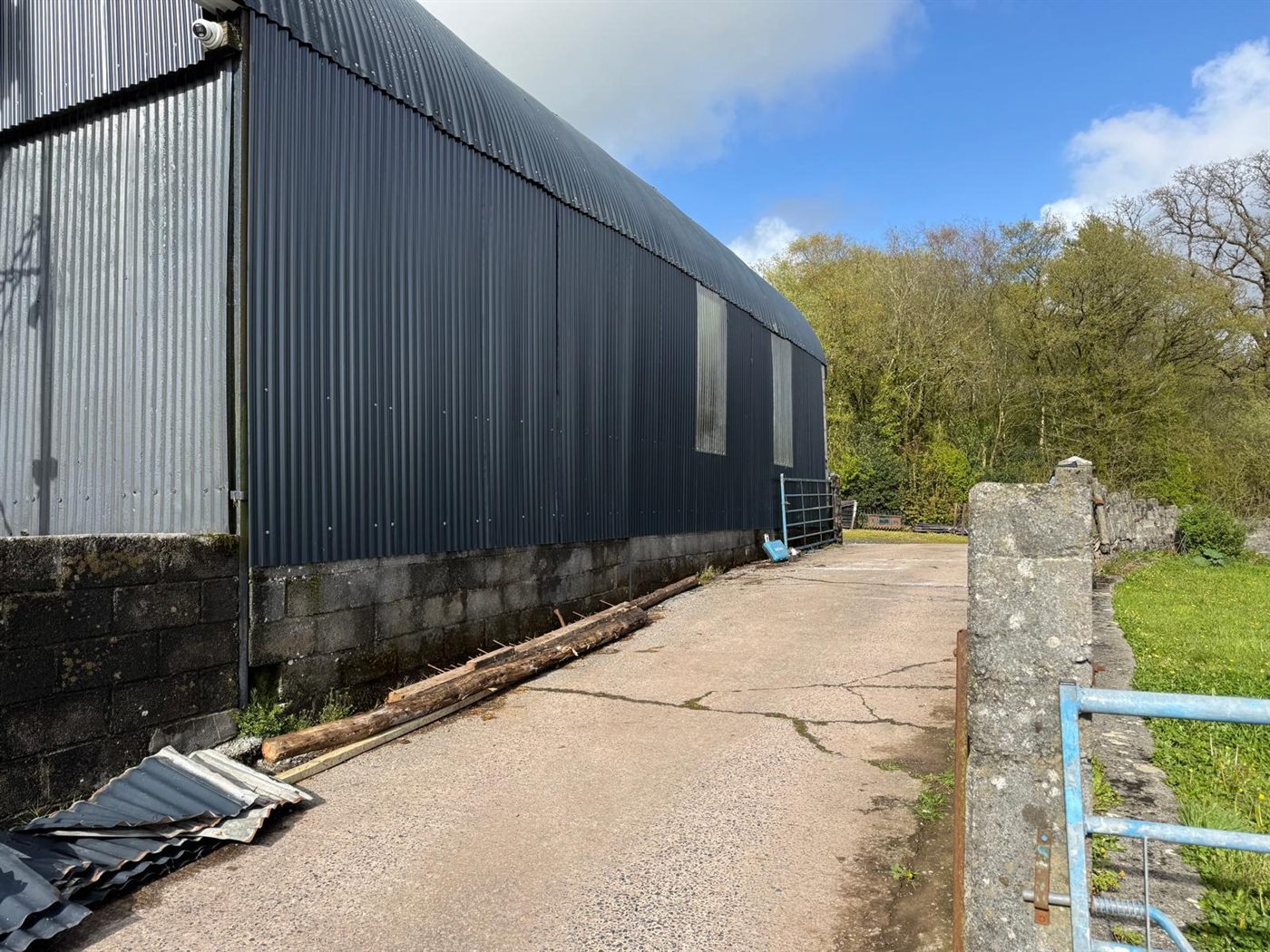 The same farm building after ESW re-roofed it, job 6