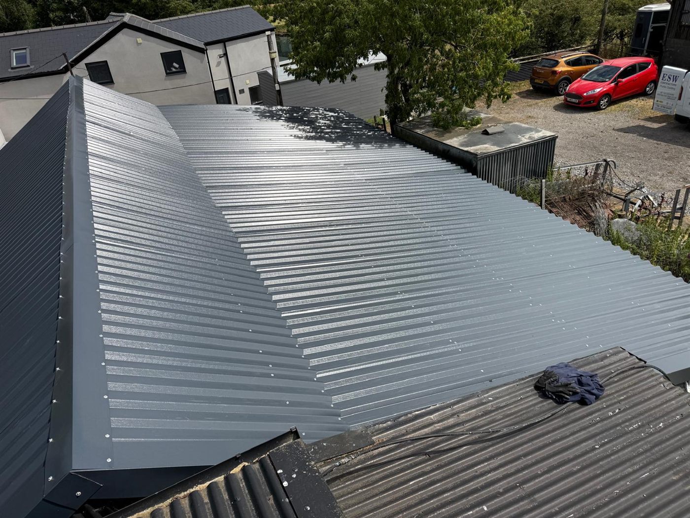 The same farm building after ESW re-roofed it, job 7