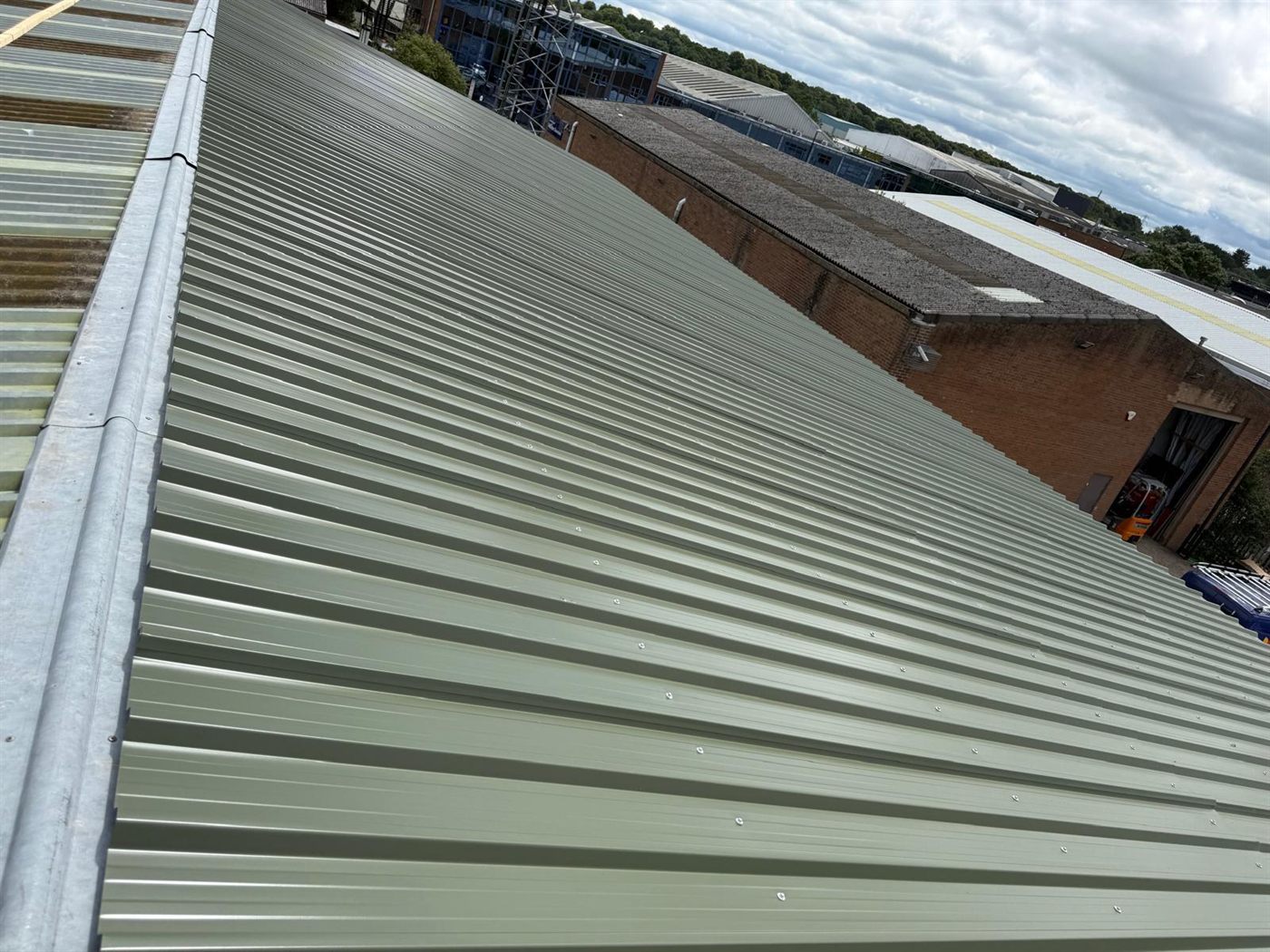 The same farm building after ESW re-roofed it, job 8