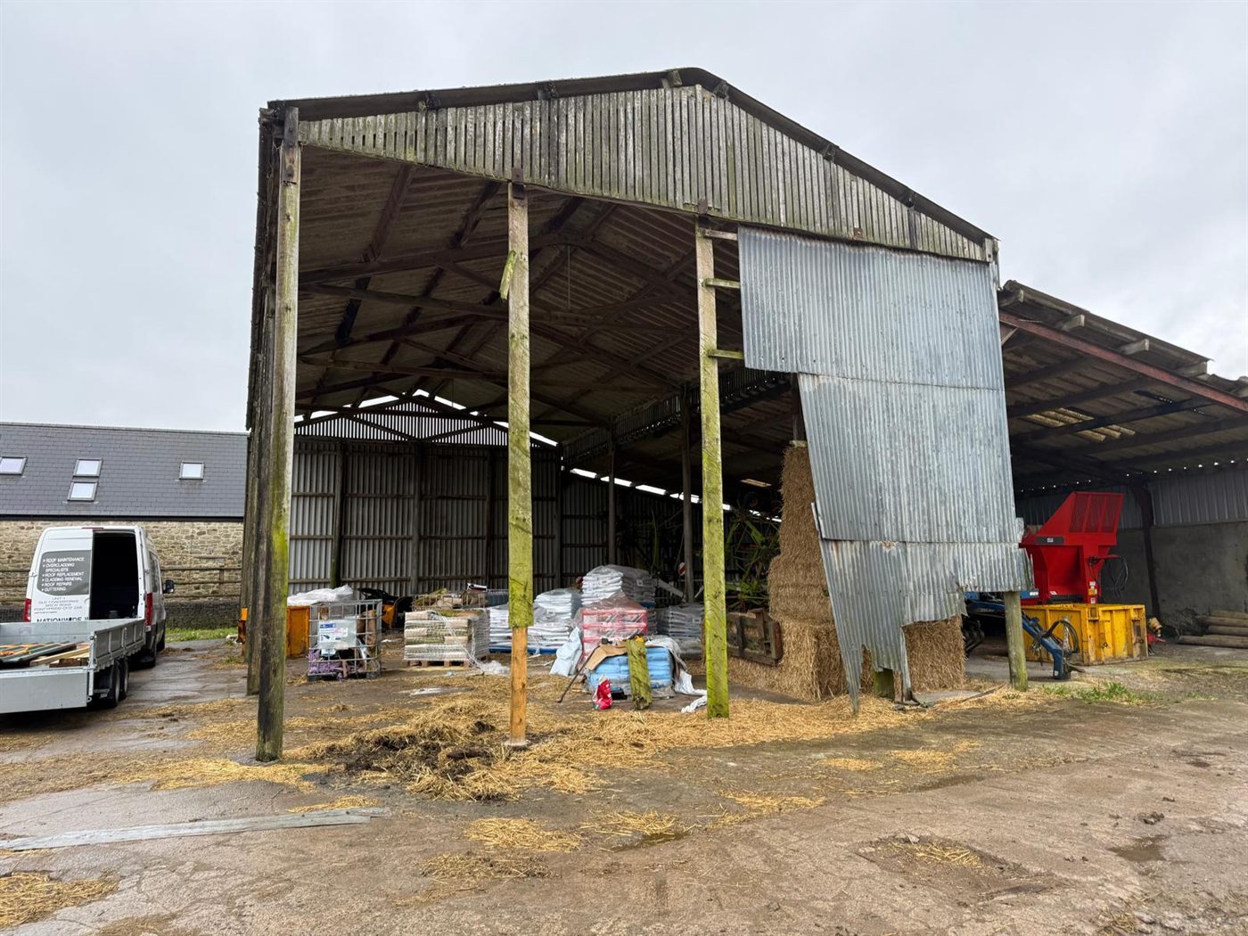 Farm building before ESW re-roofed it, job 1
