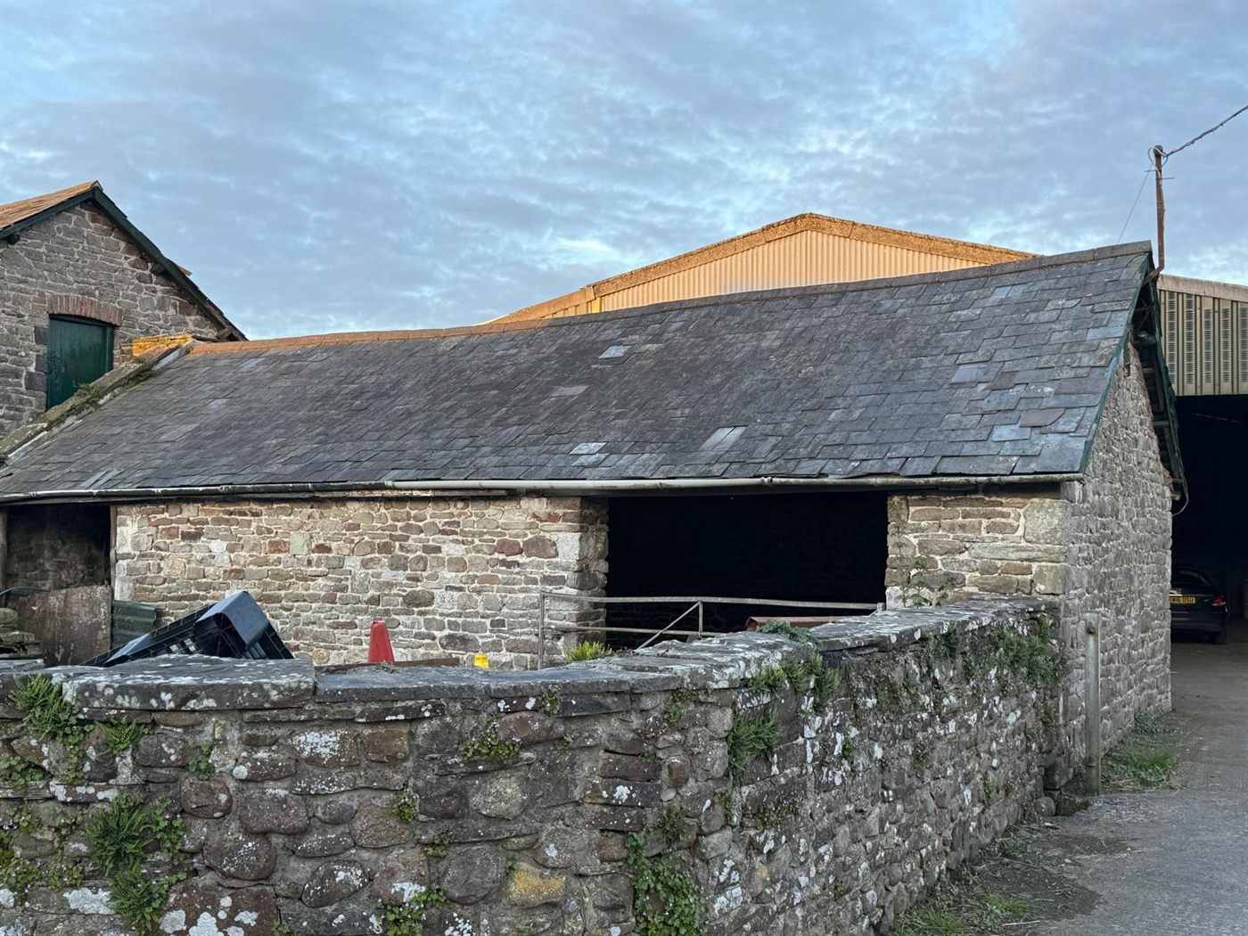 Farm building before ESW re-roofed it, job 3