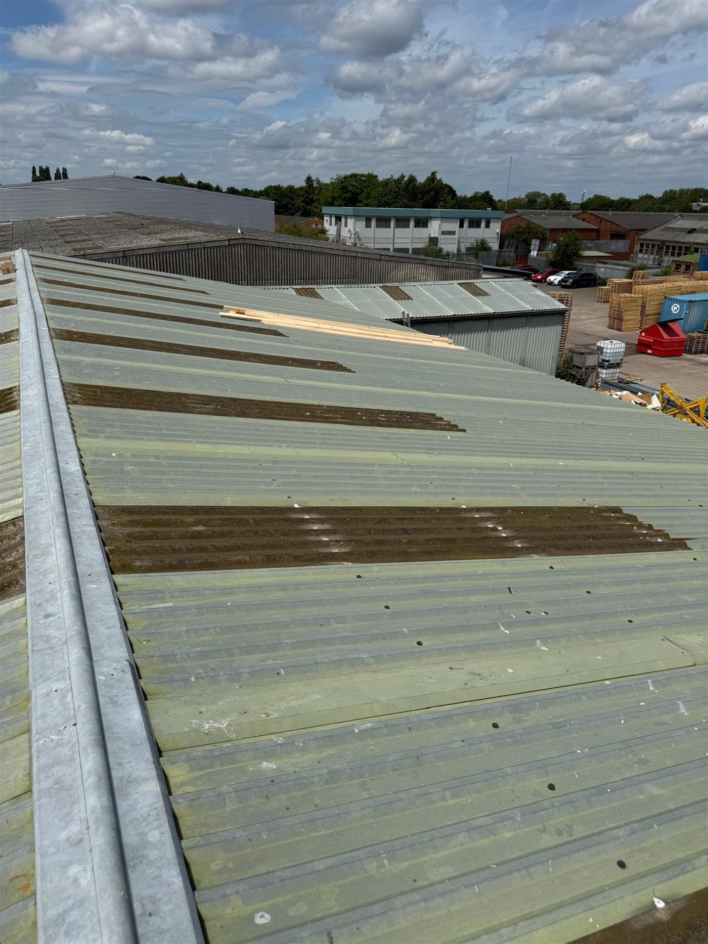 Farm building before ESW re-roofed it, job 8