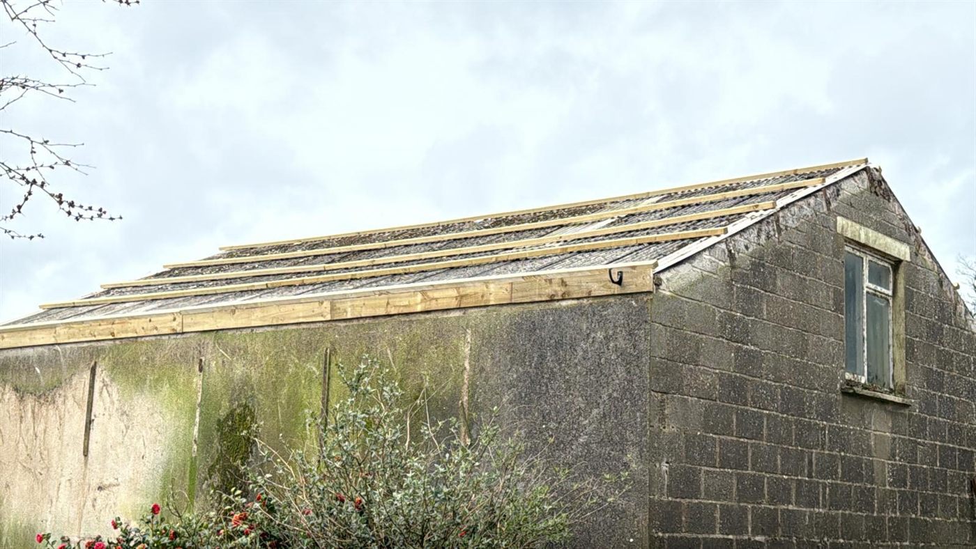 Re roofing over asbestos sheets